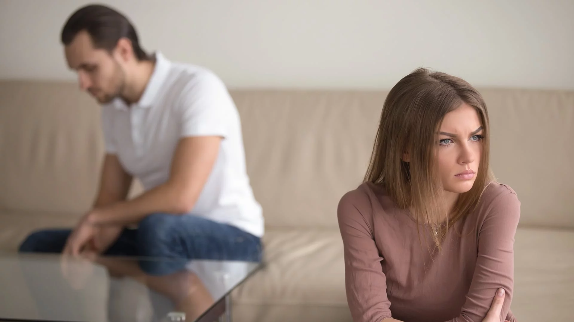 Sad couple not talking to each other after quarrel. Pensive upset woman feeling offended, thinking over problems in relationships, anxious about future, upset man sitting in the background - 7 Communication Skills