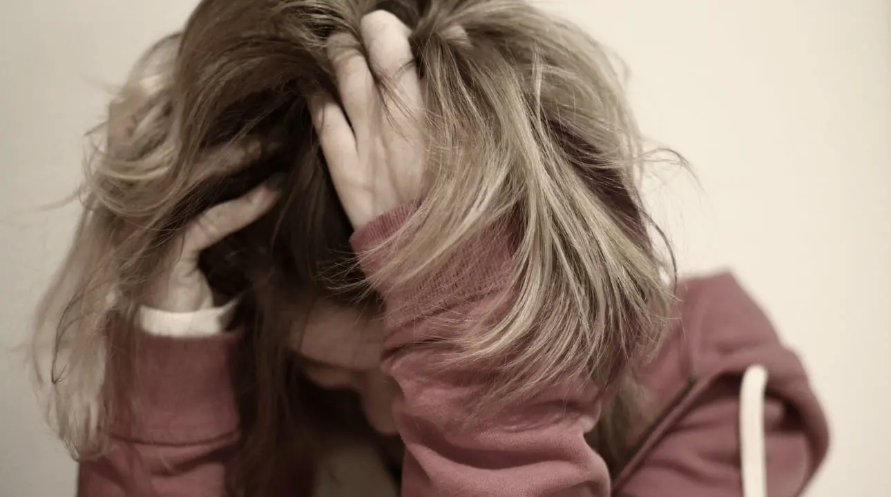 exam-stress A stressed young woman - exam stress - exam anxiety - test anxiety