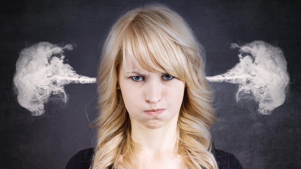 Angry woman with steam coming out of her ears - understanding anger